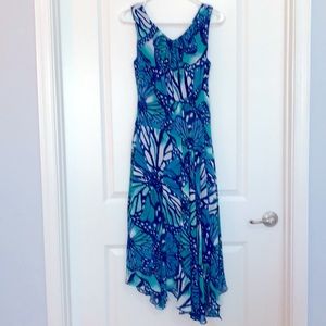 Fully lined high low dress. V shape back